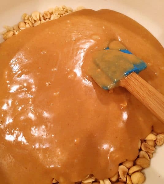 stirring peanut chewy sauce to the rice crispy
