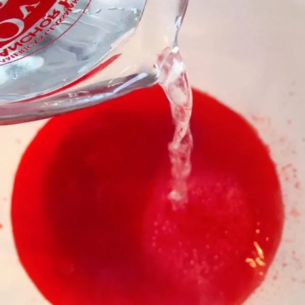 Adding boiling water to jello