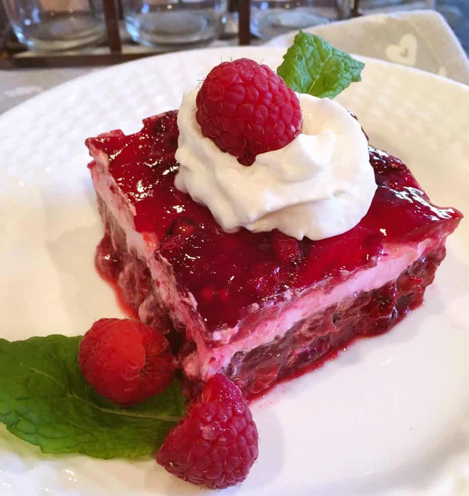 Raspberry Layered Salad slice on a plate