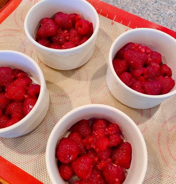 Dividing Raspberries into four different Ramekins