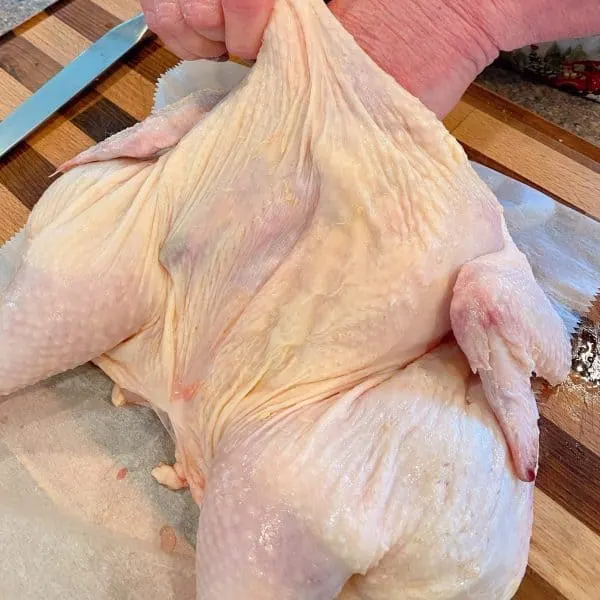 Lifting the skin for roasted chicken 