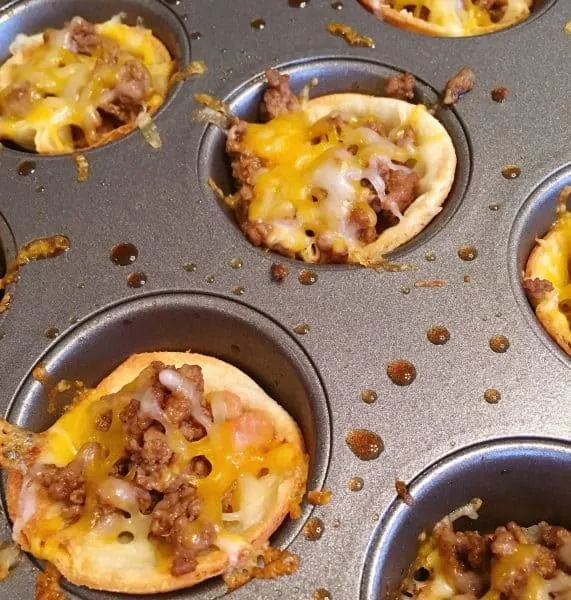 melted cheese in muffin tins