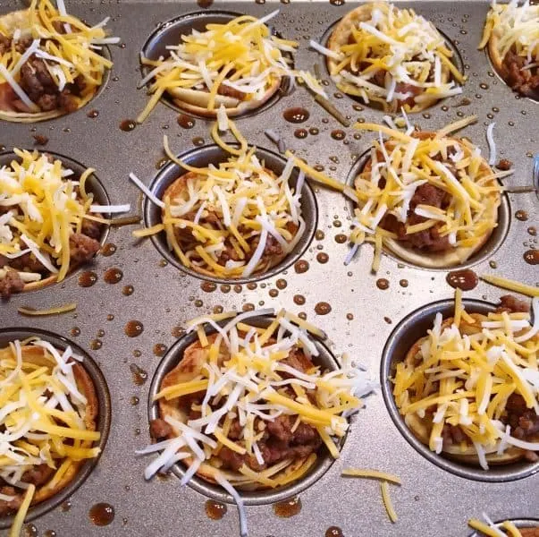 grated cheese on top of hamburger meat