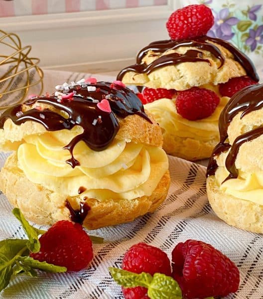 Valentine sprinkles on Cream Puffs with chocolate