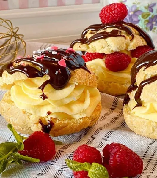 Valentine sprinkles on Cream Puffs with chocolate