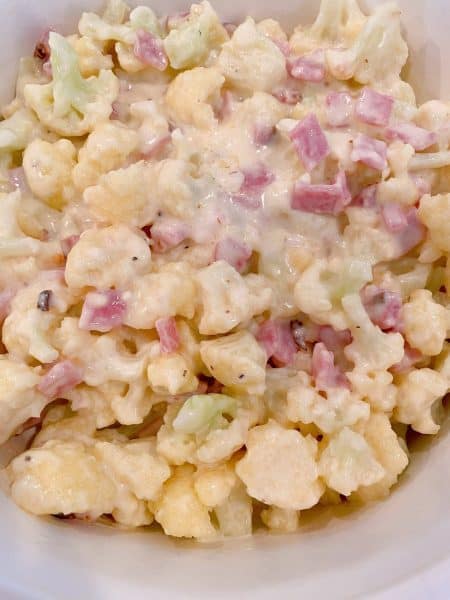 Pour cauliflower into baking dish