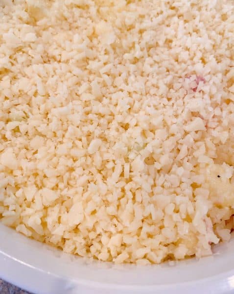 Grated Swiss Cheese on top of Cauliflower