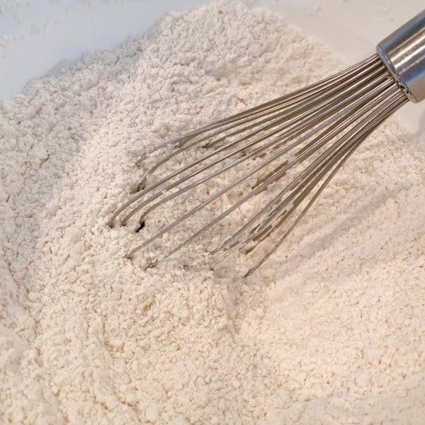 Whisking dry ingredients together 