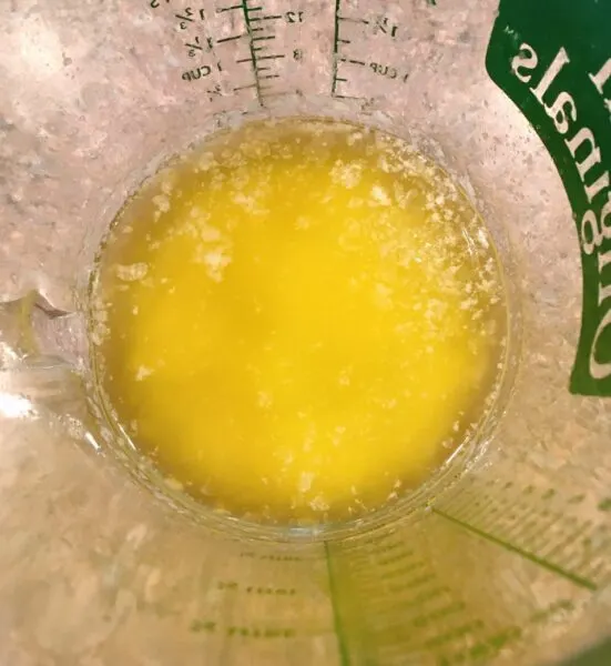 1/4 cup melted butter in measuring cup