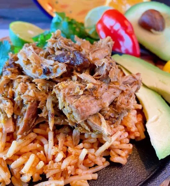 Pork Roast over spanish rice with toppings