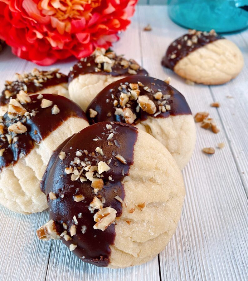 chocolate dipped sugar cookies with pecans 