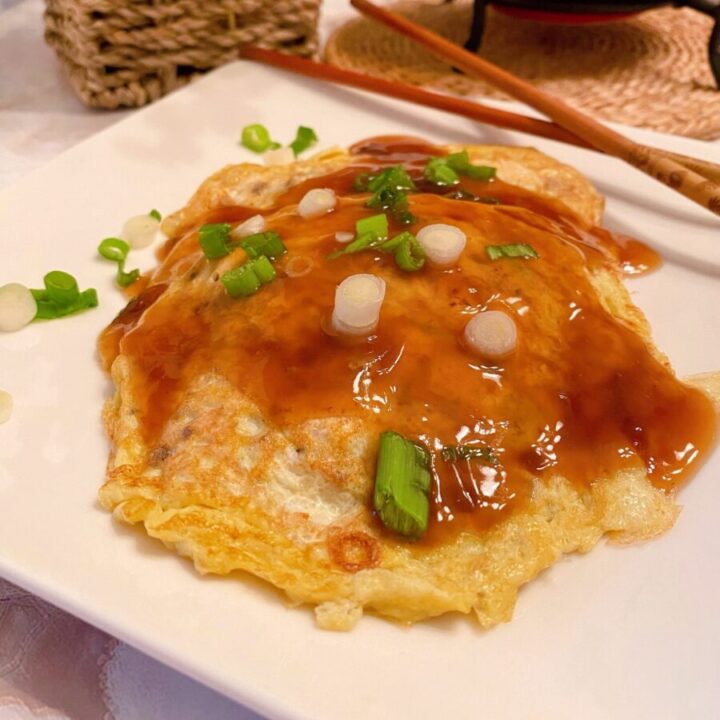 Easy Egg Foo Yung on a plate with gravy