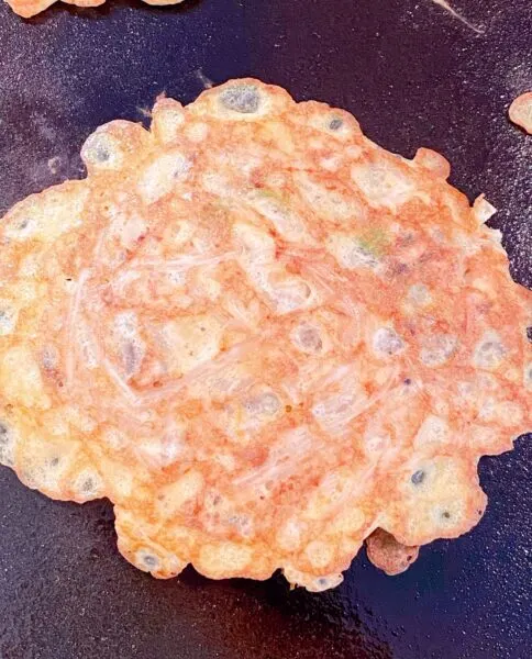 Individual Egg Foo Young on griddle