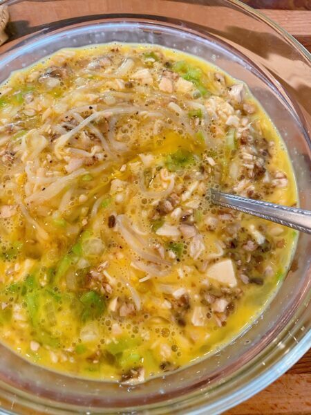 Egg added to veggie and meat mixture