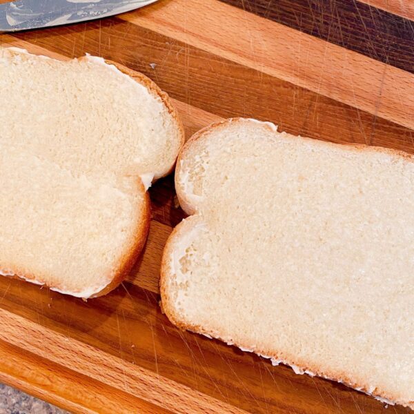Bread buttered on one side.