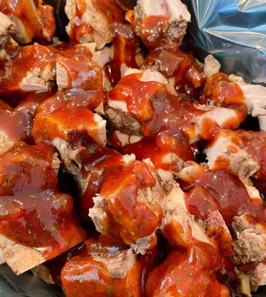 BBQ Sauce over the top of the riblets