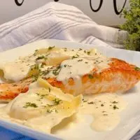 Creamy Tuscan Salmon with Lobster Ravioli