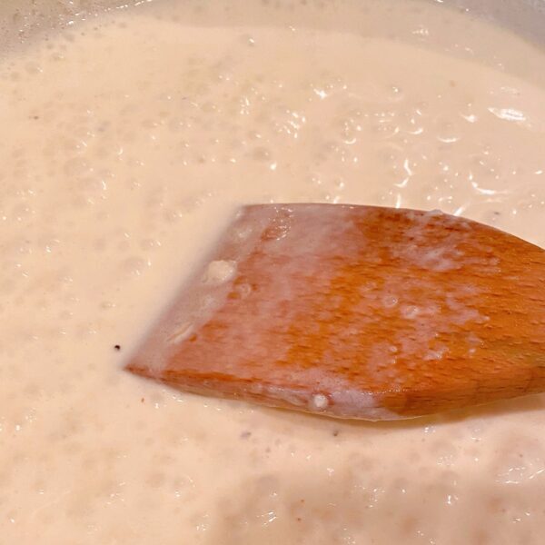 White sauce in a slow simmer