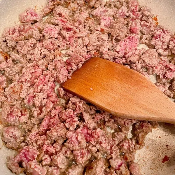 Browning ground beef in a skillet