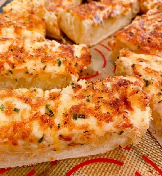 Sliced Cheesy Garlic Bread out of the oven
