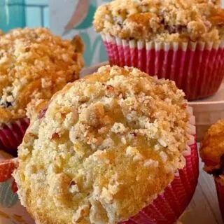 Close up photo of Raspberry-blueberry muffins with steusel topping