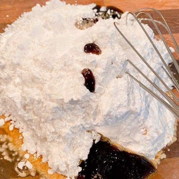 Making the vanilla glaze in a bowl