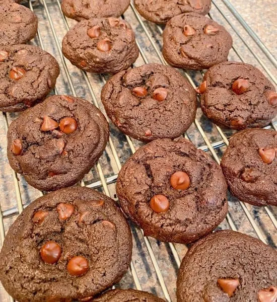 Double Chocolate Chip Cookies on cooling racks