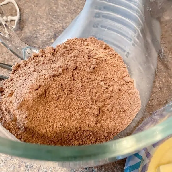One dark chocolate fudge cake mix in mixing bowl of mixer