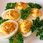 plate full of deviled eggs