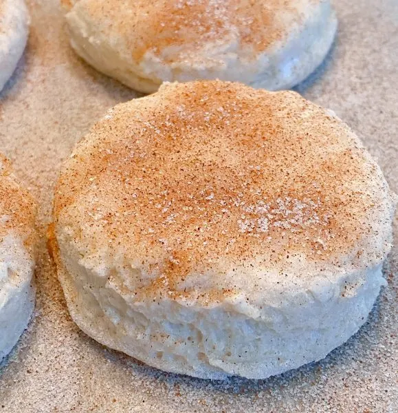 Each biscuit topped with cinnamon sugar before baking.