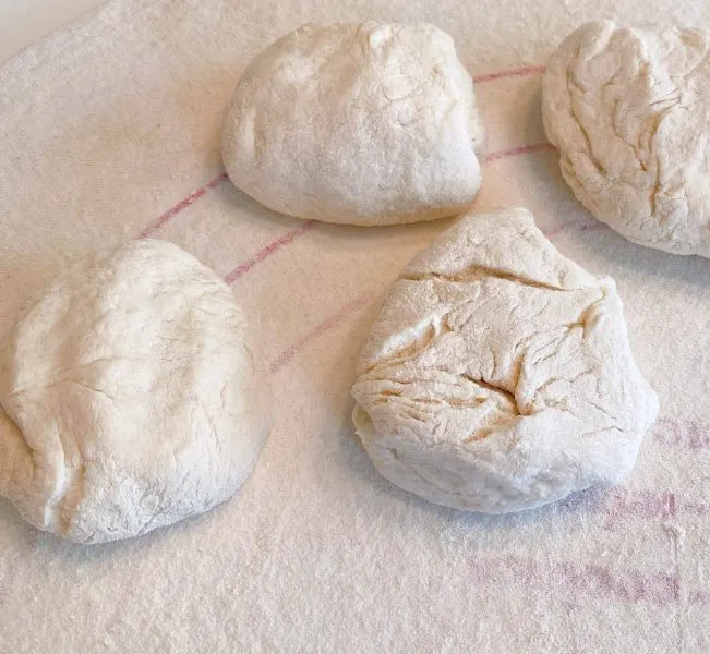 Indian Fry Bread dough cut into four individual balls.