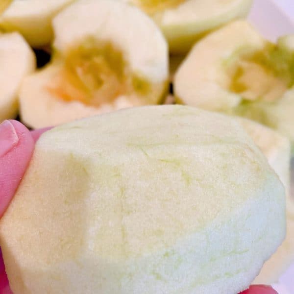 apple half with a small sliver removed from bottom so it can lay flat during baking.