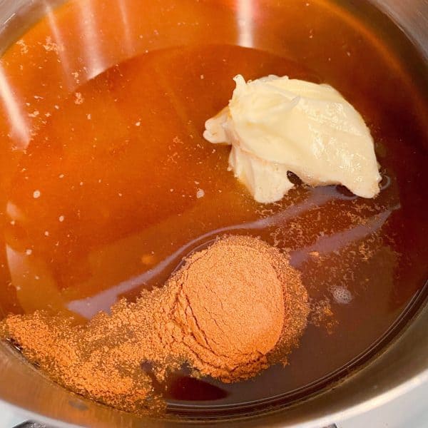 Water, butter, brown sugar, and cinnamon in small sauce pan for cinnamon sauce.