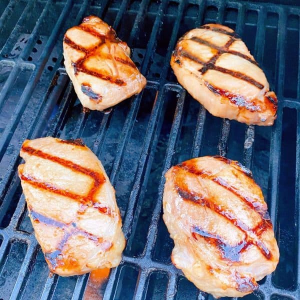 Pork Chops turned over during cooking.