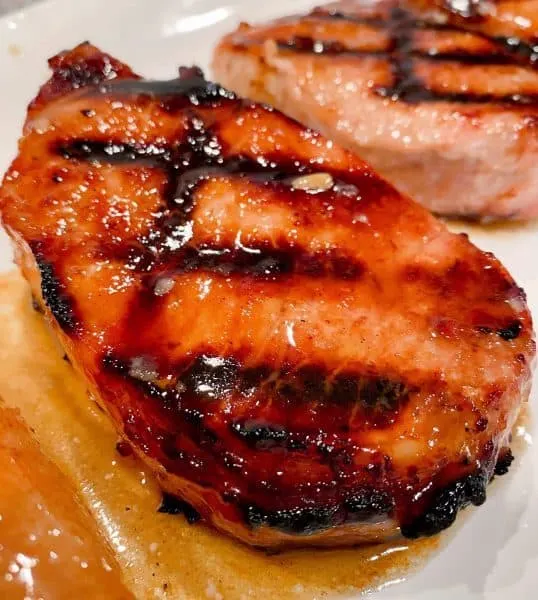 Close up of a grilled pork chop.