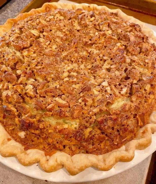 Baked Pecan Caramel Cheesecake Pie.