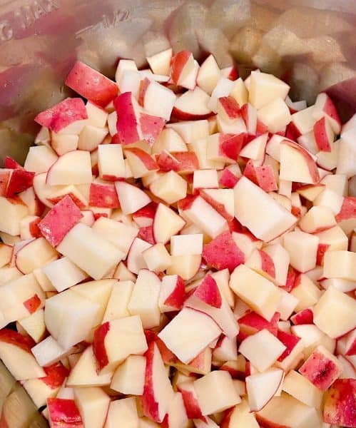 Red Potatoes Cut Into small bite size pieces and placed in the bottom of the Instant Pot.