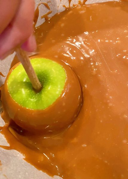 Dipping the Apples into the warm caramel