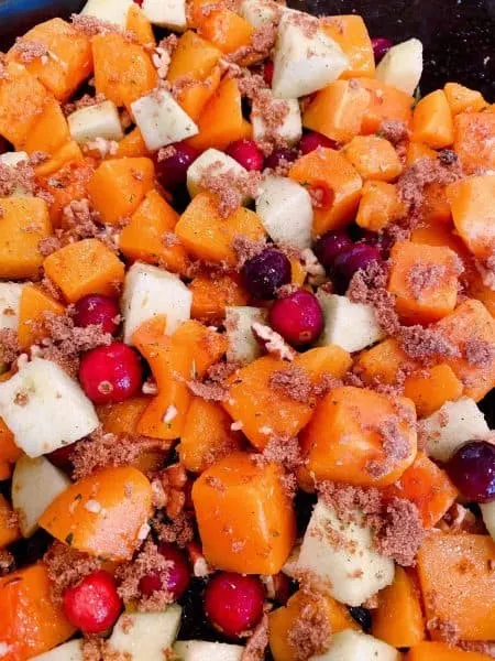 All the Butternut Squash ingredients on a baking sheet with brown sugar.
