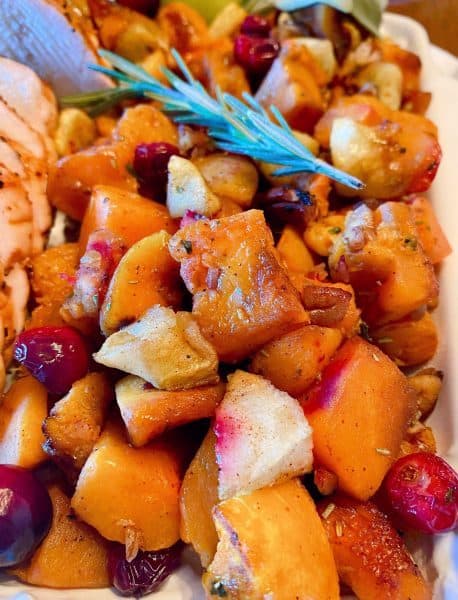 Roasted Squash and cranberries and apples. Garnished with rosemary sprigs.