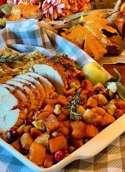 Roasted Butternut with Herb Crusted Pork on a platter.