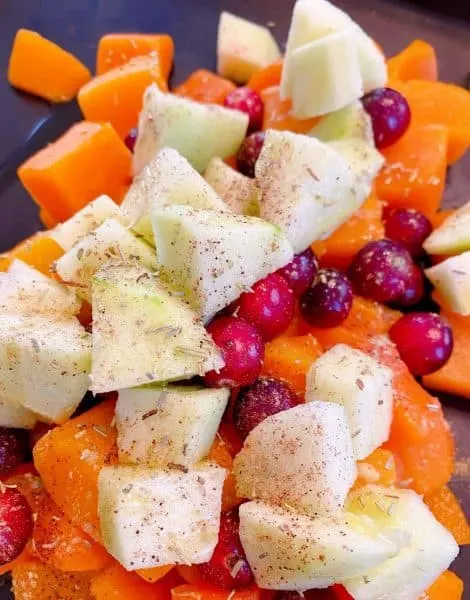 Chopped Butternut Squash, chopped fresh apples, and fresh cranberries.