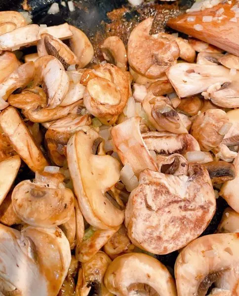 Mushrooms, onion, and garlic in skillet 