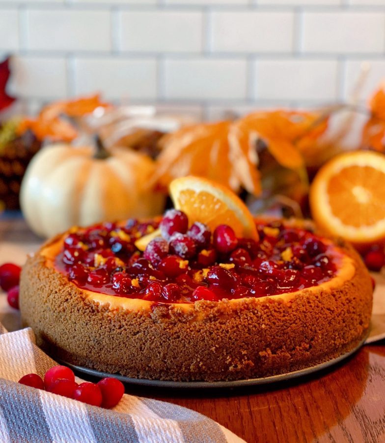 Cranberry Orange Cheesecake with Fall background