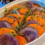 Casserole dish filled with Sweet Baked Potato Medley