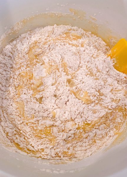 Combining wet and dry ingredients for Cranberry Eggnog Mixture