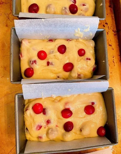 mini loaves on a baking sheet ready for the oven