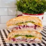 Hot Cranberry Turkey Sandwich cut in half.