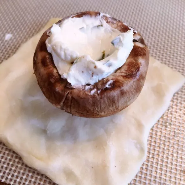 Puff pastry cut into squares for mushrooms.