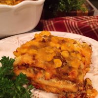 Easy Mexican Lasagna on a plate ready to eat.